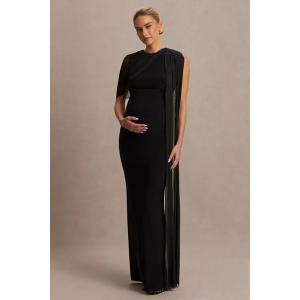 Amelise | Robe de maternité longue noire à col montant avec manche cape en mesh et ceinture fluide