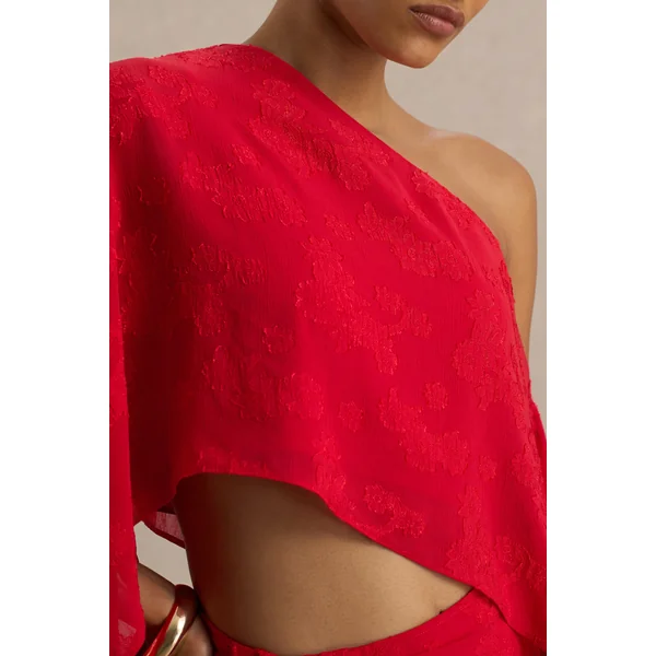 Aruba | Haut court rouge asymétrique à manches longues en satin dévoré