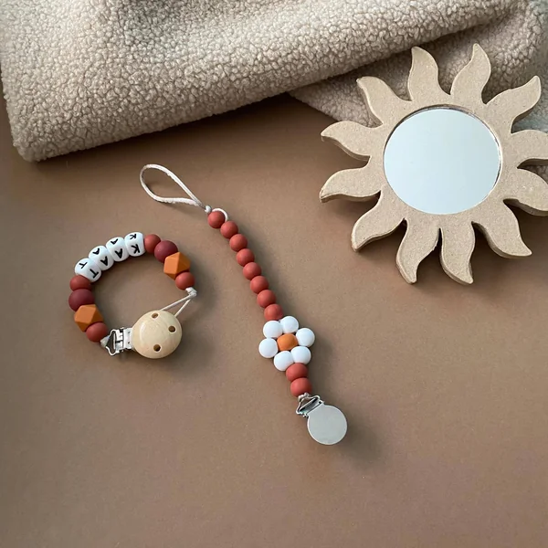 Attache-sucette Flora Friemel - Soins Bébé Naturels & Produits Maman Après Naissance