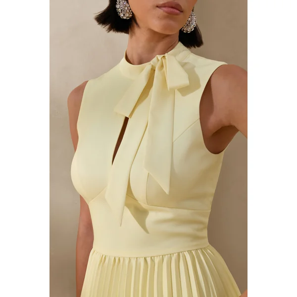 Avalon | Robe mi-longue citron avec jupe plissée et détail nœud