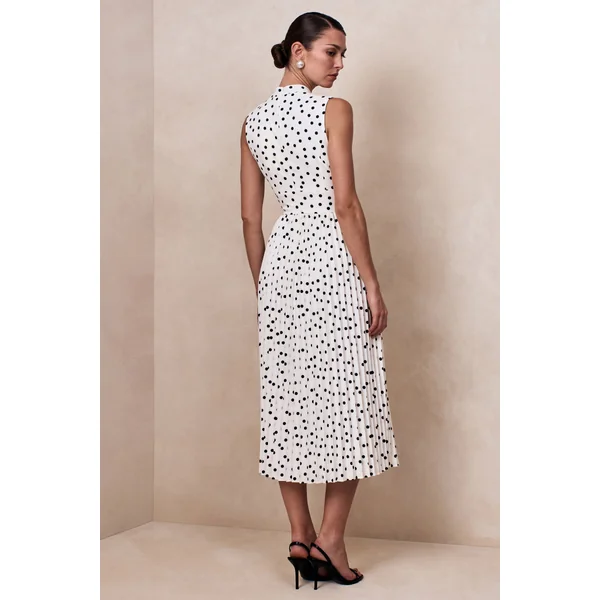 Avalon | Robe mi-longue à pois blancs à encolure écharpe avec jupe plissée