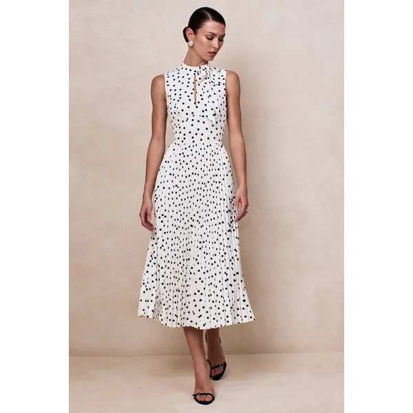 Avalon | Robe mi-longue à pois blancs à encolure écharpe avec jupe plissée