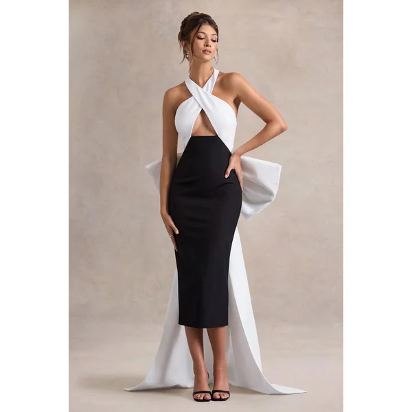 Blanca | Robe mi-longue noire et blanche à col licou, découpée avec un nœud surdimensionné