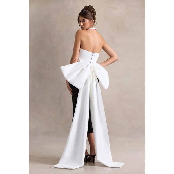 Blanca | Robe mi-longue noire et blanche à col licou, découpée avec un nœud surdimensionné