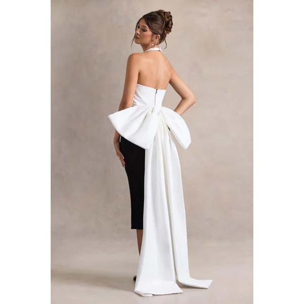 Blanca | Robe mi-longue noire et blanche à col licou, découpée avec un nœud surdimensionné