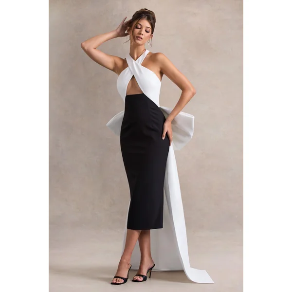 Blanca | Robe mi-longue noire et blanche à col licou, découpée avec un nœud surdimensionné