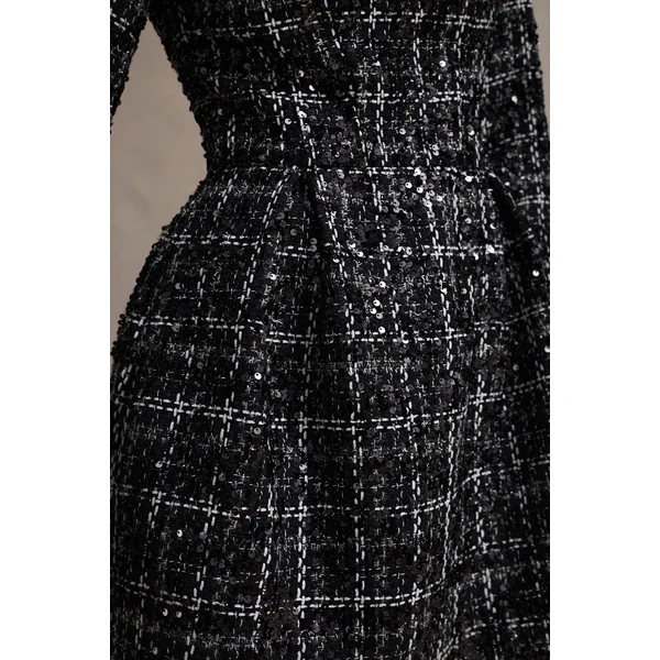 Contessa | Mini-robe noire en bouclé à manches longues