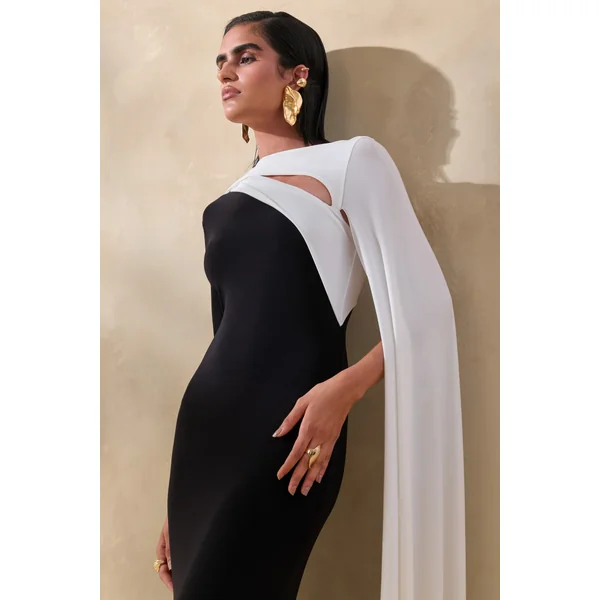 Dabria | Robe longue noire et blanche à encolure asymétrique avec manche cape