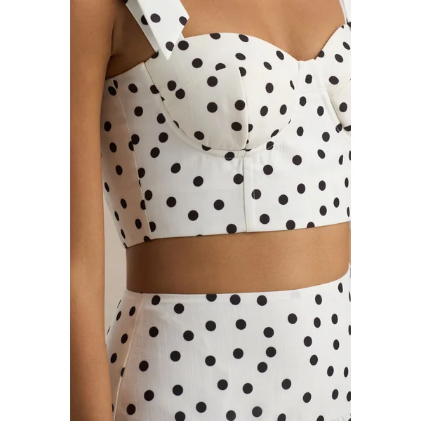 Emry | Jupe longue taille haute à imprimé pois blancs ornée de volants