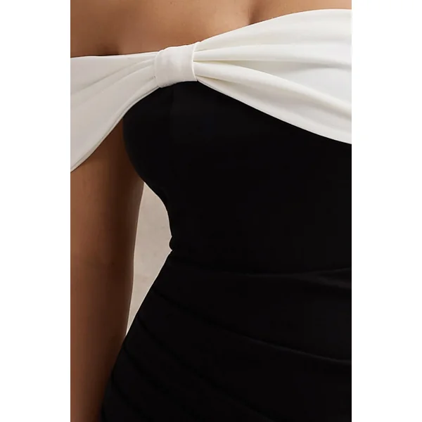 Eva | Robe longue bardot noire et blanche avec nœud et fente