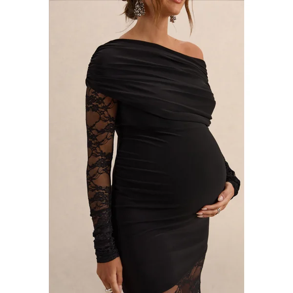 Giuliana | Robe longue de grossesse noire à encolure asymétrique avec détails en dentelle