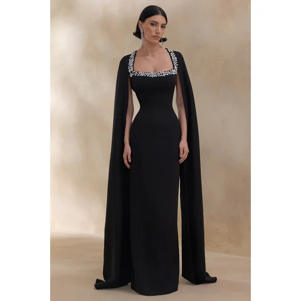 Glossy | Robe longue noire encolure carrée à manches cape et ornements scintillants