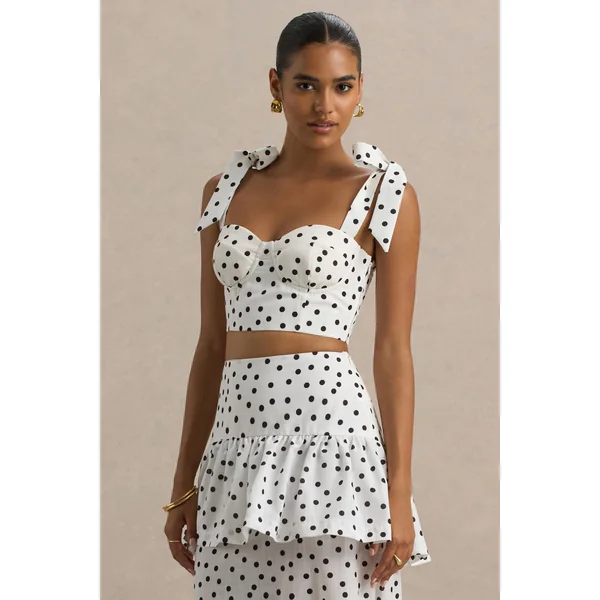 Lumen | Top corset blanc à pois avec décolleté cœur et bretelles à nœuds