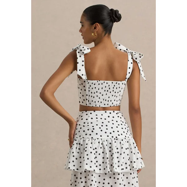 Lumen | Top corset blanc à pois avec décolleté cœur et bretelles à nœuds