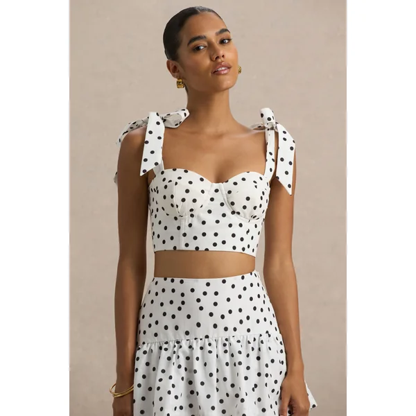 Lumen | Top corset blanc à pois avec décolleté cœur et bretelles à nœuds