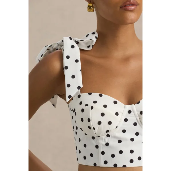 Lumen | Top corset blanc à pois avec décolleté cœur et bretelles à nœuds