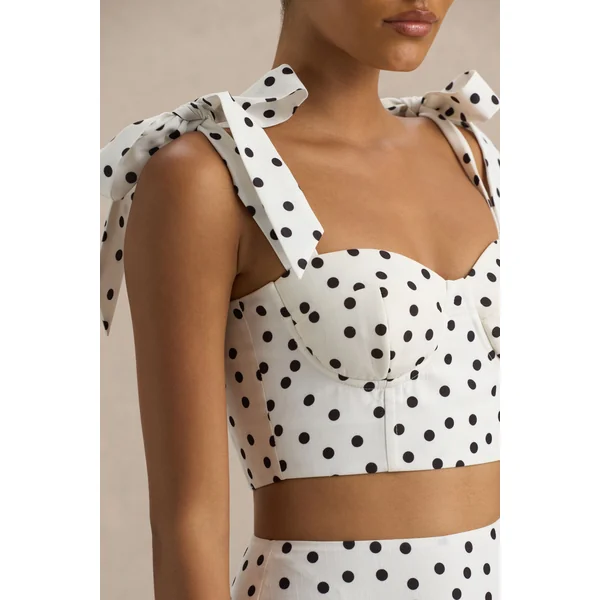 Lumen | Top corset blanc à pois avec décolleté cœur et bretelles à nœuds