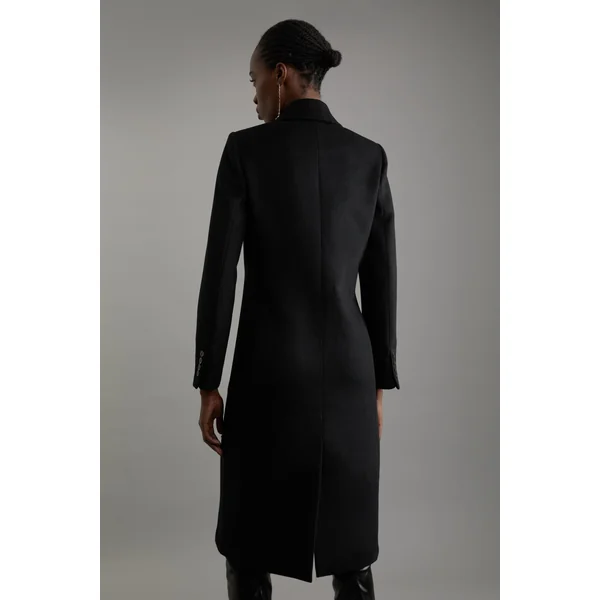 Manteau mi-long sur mesure à double boutonnage en mélange de laine avec appliques en satin embellies