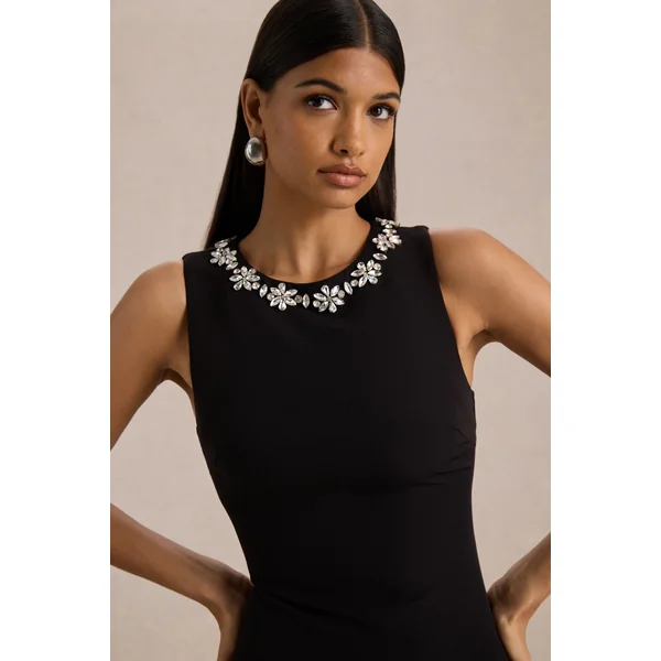 Nalani | Mini-robe noire et blanche à col rond ornée et ourlet volanté