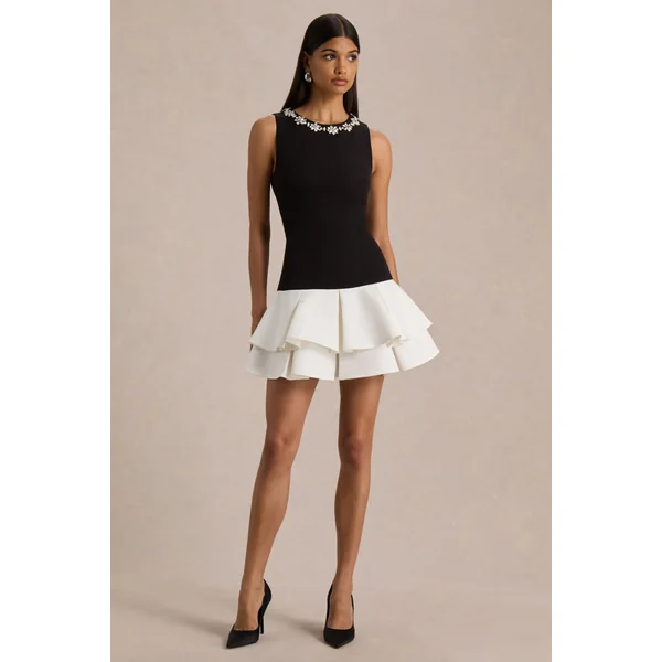 Nalani | Mini-robe noire et blanche à col rond ornée et ourlet volanté