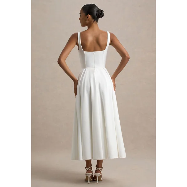 Parina | Robe mi-longue blanche à bretelles et ourlet volumineux
