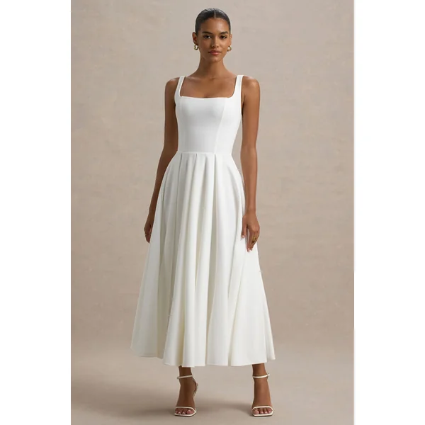 Parina | Robe mi-longue blanche à bretelles et ourlet volumineux
