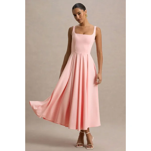 Parina | Robe mi-longue rose à bretelles et ourlet volumineux