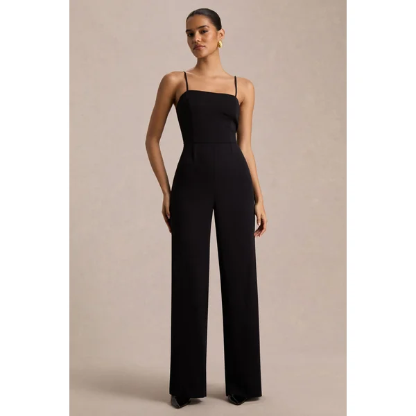 Raquel | Combinaison noire à encolure asymétrique avec drapé