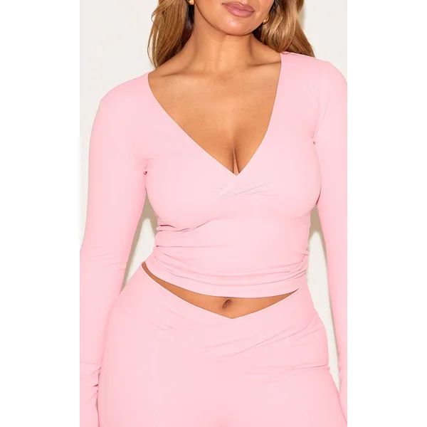 Rose Bonbon Top Moulant Actif À Manches Longues Avec Encolure Cache-cœur Shape Sculpt