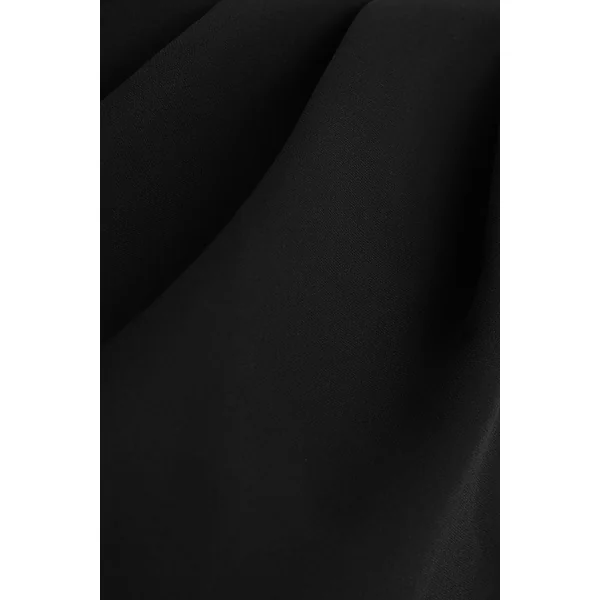 Sorenia | Combinaison noire à col montant avec manche cape