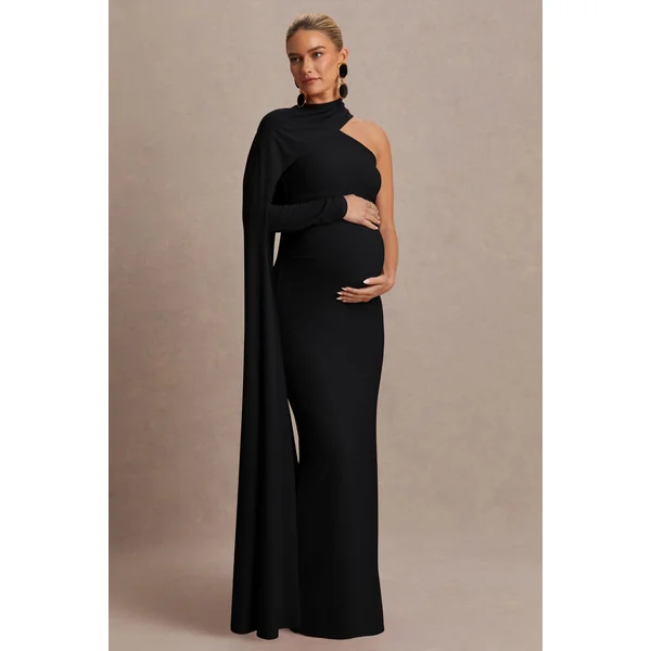 Tessy | Robe de maternité longue noire à encolure asymétrique et manche cape