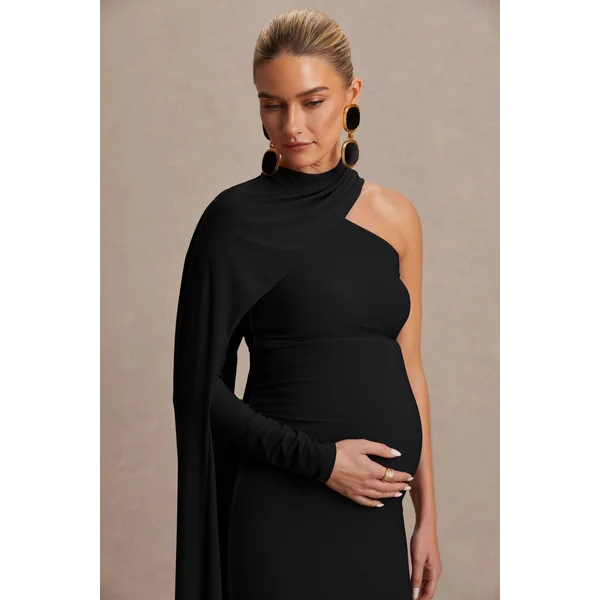 Tessy | Robe de maternité longue noire à encolure asymétrique et manche cape