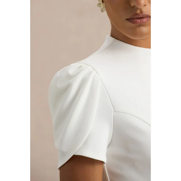 Vicky | Robe mi-longue blanche à col haut avec manches bouffantes