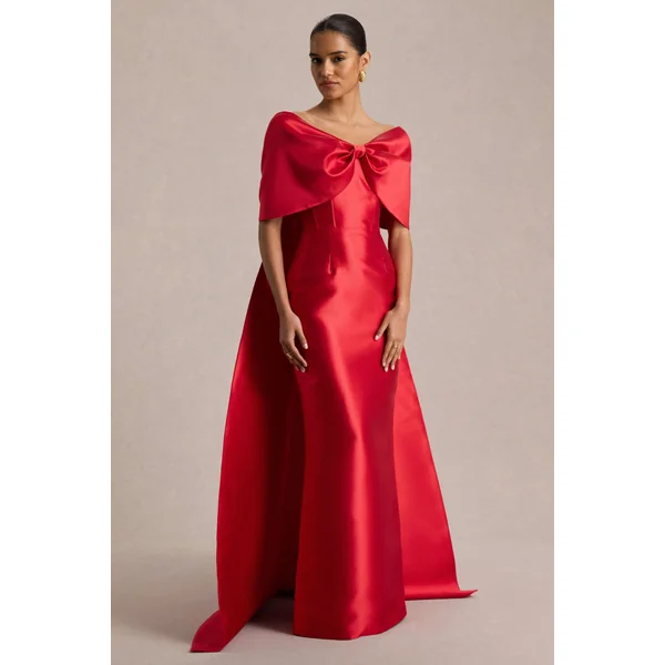 Wanting More | Robe longue en satin rouge avec cape et nœud oversize