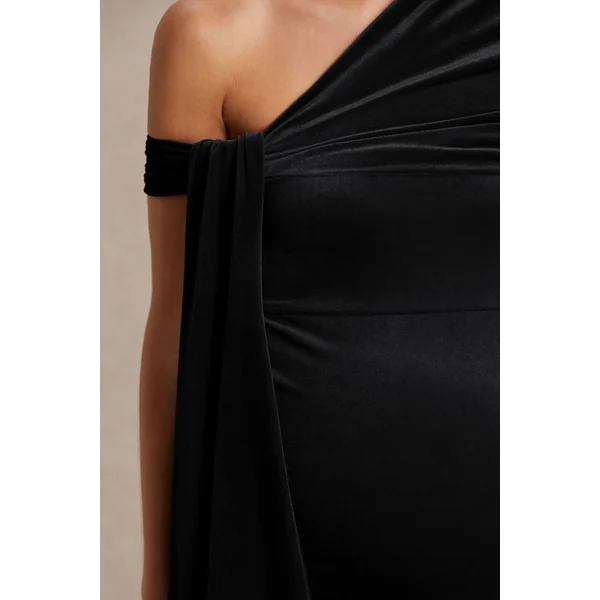Zena | Robe mi-longue de maternité en velours noir à encolure asymétrique avec détail noué et ceinture