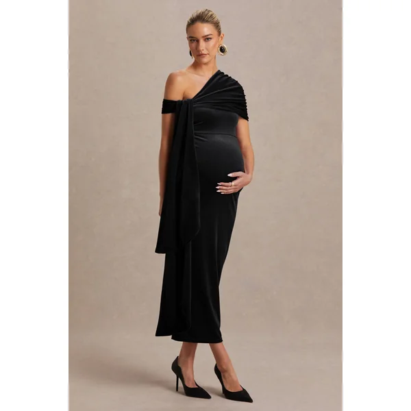 Zena | Robe mi-longue de maternité en velours noir à encolure asymétrique avec détail noué et ceinture