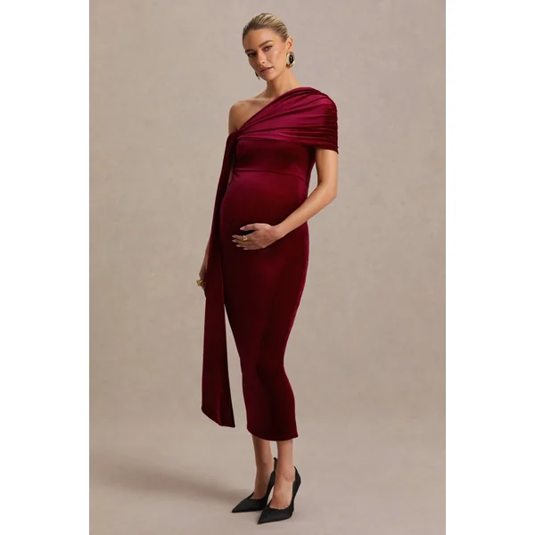 Zena | Robe mi-longue de maternité en velours rouge bordeaux à encolure asymétrique avec détail noué