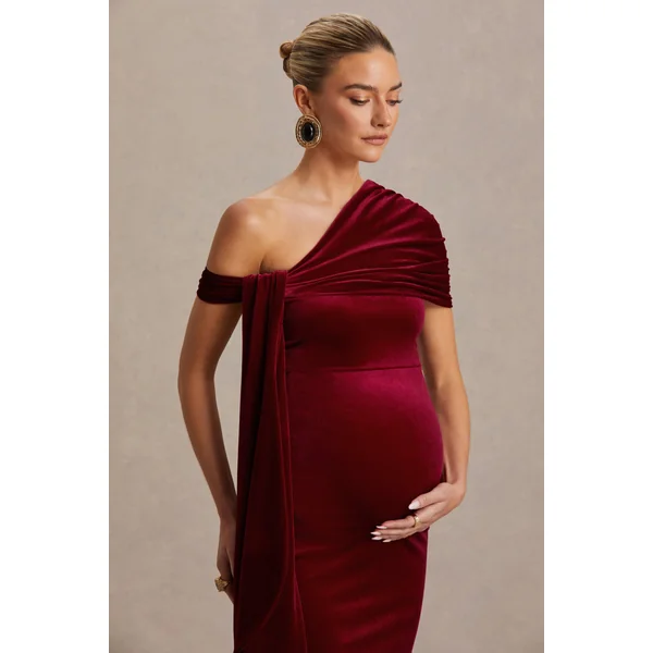Zena | Robe mi-longue de maternité en velours rouge bordeaux à encolure asymétrique avec détail noué